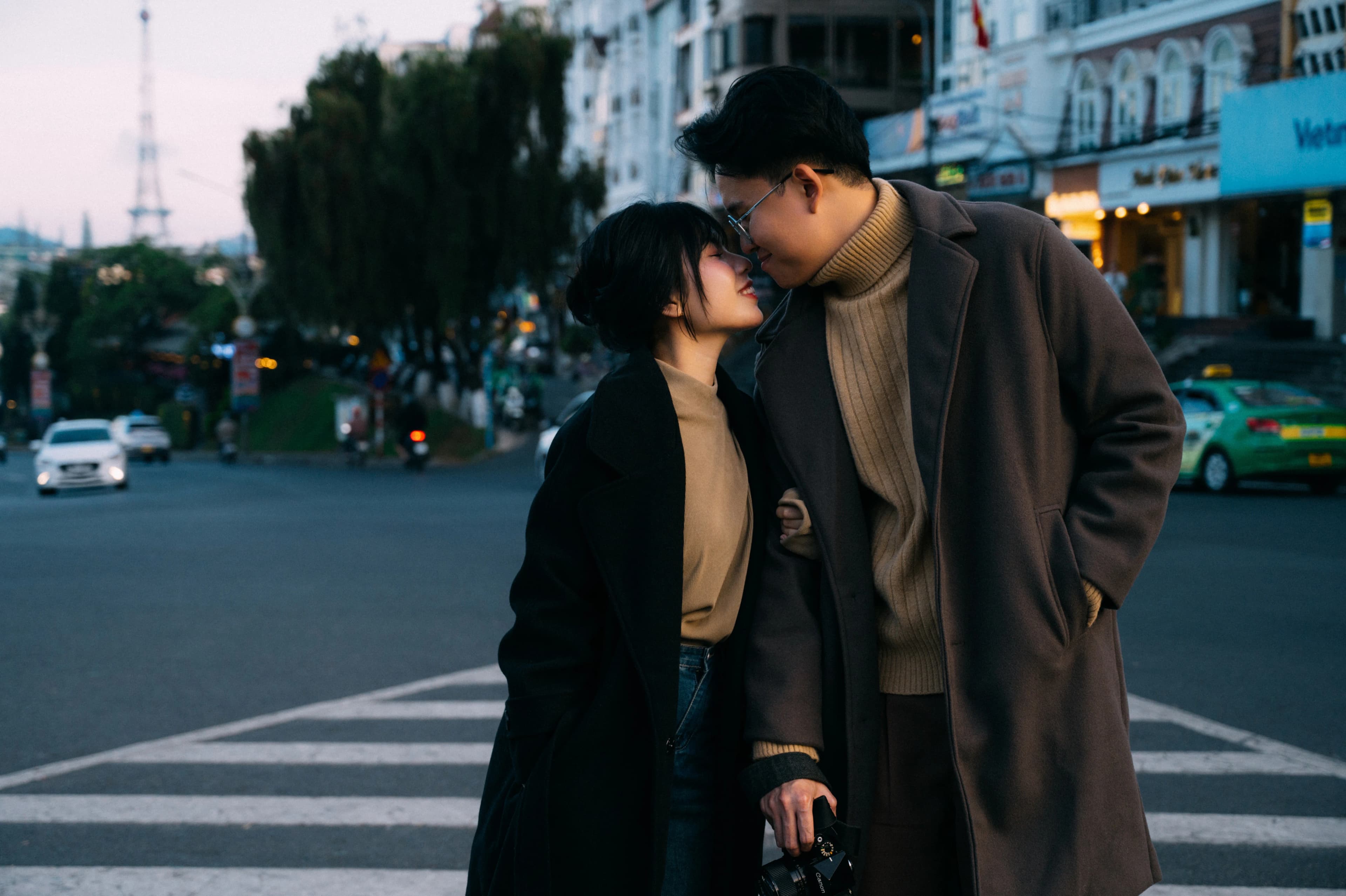 Beautiful white wedding arch with green foliage
